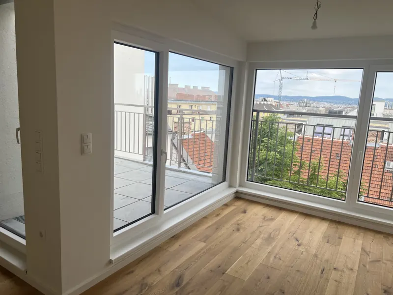 Fertige Dachgeschoßwohnung mit Eichenparkett und Blick über Wien, Sanierung Favoritenstraße, 1100 Wien